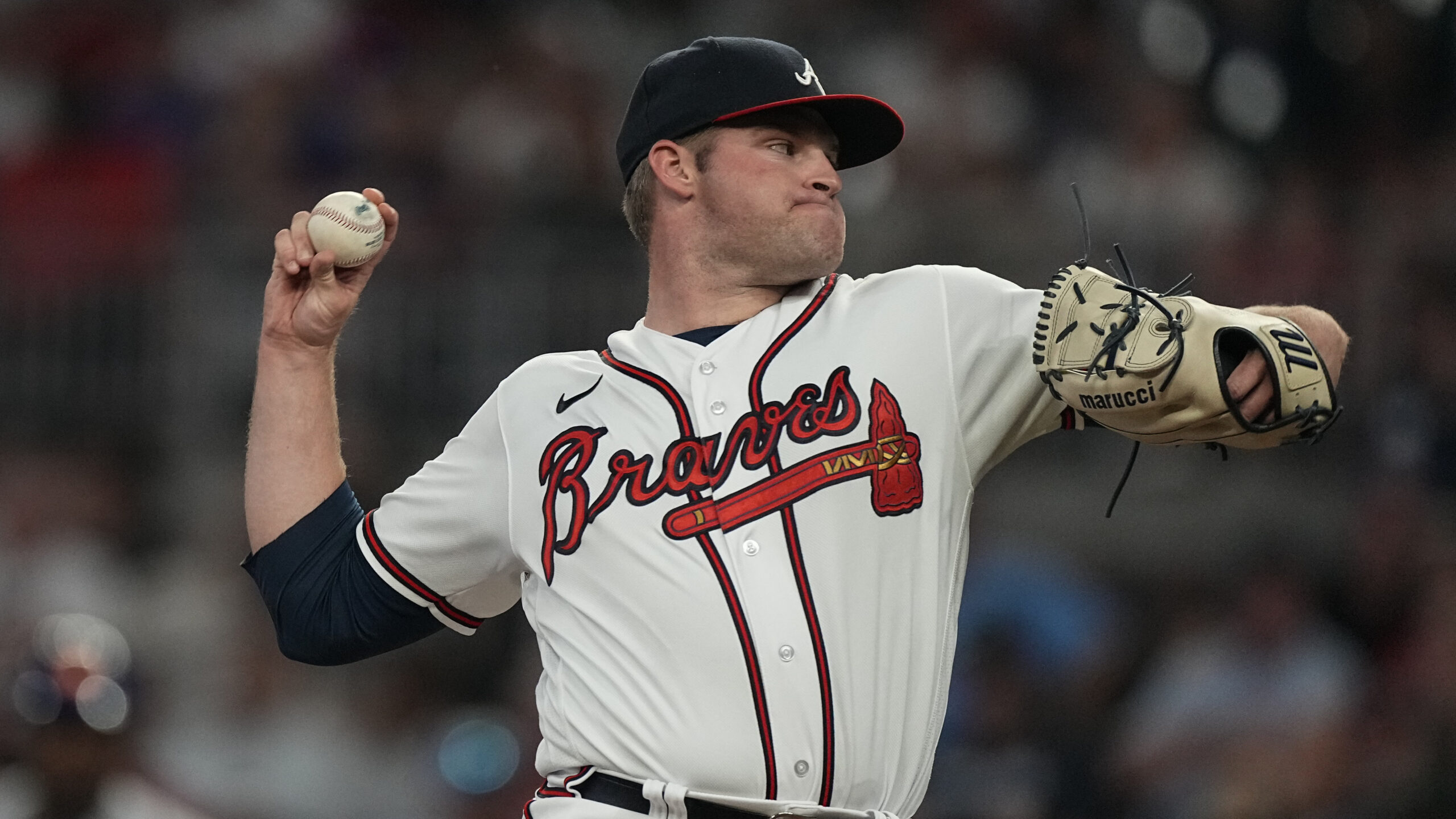 Atlanta Braves starting pitcher Bryce Elder (55) delivers in the first inning of a baseball game ag...